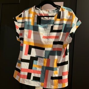 Colorful blocked blouse. Side medium, never worn, no tags.